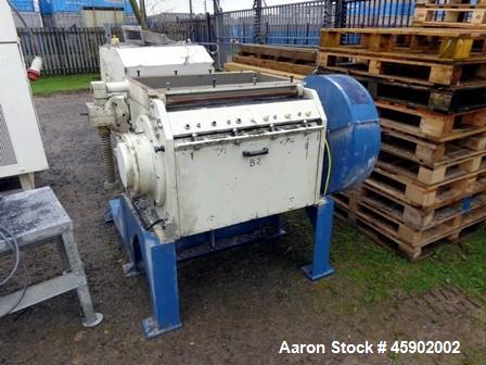 Used Tria Granulator, Type 80-49/DN-SL, Carbon Steel. Approximate 15.6" diameter x 24.9" wide (400mm x 830 mm) rotor, (5) rotor knives, (2) bed knives. Driven by a 55kw (82.5hp), 3/50/400/690 volt, 1...