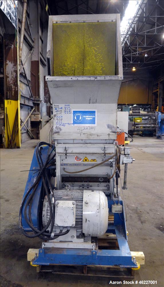 Used Tria Granulator, Carbon Steel. Approximate 20" x 26" feed throat with a bolt on feed hopper. Approximate (4) rows bolt on blades, open rotor, set up for bottom blower discharge with a 2.2kw blow...