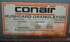 USED: Conair Hushgard granulator, model G1420. 3 bolt-on blade openrotor. Pelican feed hopper with 2 metal pull rolls for back sheetfeed, driven by a 3/4 hp DC motor. Unit set up for bottom blowerdis...