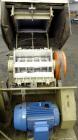 Used Cumberland Granulator, Model 585-3KN.  Approximately 20” x 14” feed opening with tilt back feed hopper. Approximately 12” diameter x 20” wide (3) bolt on blade open rotor.  Bottom discharge with...