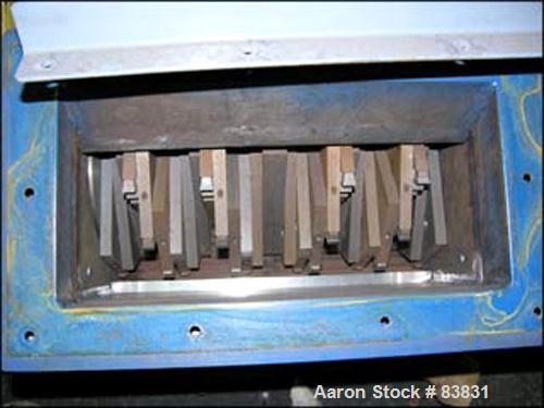 USED: Chipper, 6" x 15" feed opening, segmented rotor with carbide tips, 15 hp 230/460 volt motor, feed hopper with magnets.