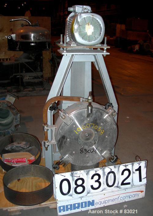 USED: Pallman Type Mill. 316 stainless steel. 20" diameter x 5" deep chamber, 16" diameter screen, approximate 1/4" holes. Carbon steel rotor with bolt-on blades. Side feed (missing feed chute), 4" x...