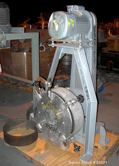 USED: Pallman Type Mill. 316 stainless steel. 20" diameter x 5" deep chamber, 16" diameter screen, approximate 1/4" holes. Carbon steel rotor with bolt-on blades. Side feed (missing feed chute), 4" x...