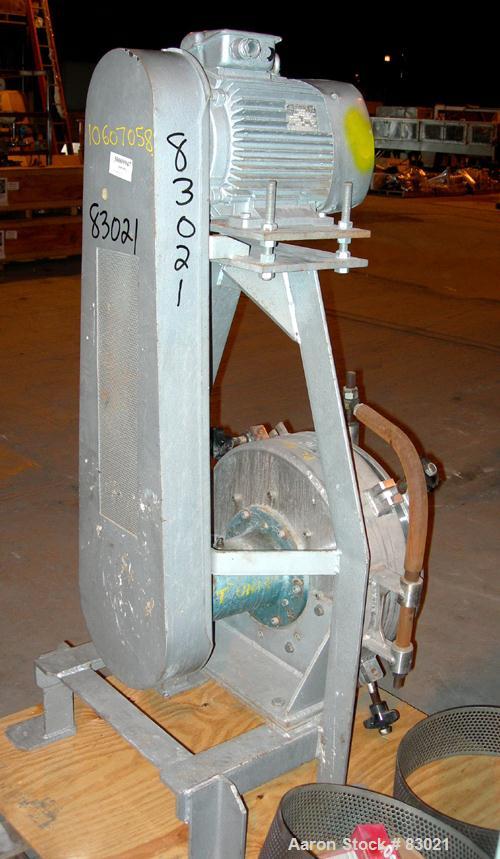 USED: Pallman Type Mill. 316 stainless steel. 20" diameter x 5" deep chamber, 16" diameter screen, approximate 1/4" holes. Carbon steel rotor with bolt-on blades. Side feed (missing feed chute), 4" x...