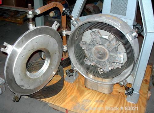 USED: Pallman Type Mill. 316 stainless steel. 20" diameter x 5" deep chamber, 16" diameter screen, approximate 1/4" holes. Carbon steel rotor with bolt-on blades. Side feed (missing feed chute), 4" x...