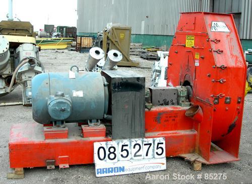 Used United Farm Tools Inc Hammermill, Model MM6215PL80, Carbon Steel. Approximate 40" diameter disc rotor with bolt-on blades. 4", 6" side bottom feed openings, 15" x 18" top discharge with approxim...