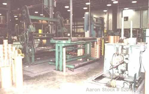 USED: Cameron 84" trim width surface slitter/rewinder, model 14.Consisting of separate shaftless unwind stand for a 72" OD roll,3" to 12" ID cores. Shear cut slitting action, 5-1/2" minimum slitting ...