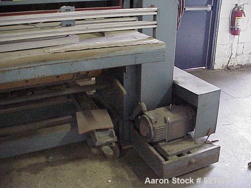 USED: IMO Corfine rotary die cutter, 66" wide. Pressure adjusted by raising or lowering the drum rolls. Driven by a 5 hp, 500 volt DC motor. The motor controller is manufactured by Fincor.