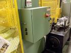 Used Richmond Engineering Reel Splitter.  The system has a heavy frame, hydraulic pump, accumulator and cylinder.  The cylinder actuates a 74
