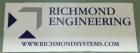 Used Richmond Engineering Reel Splitter.  The system has a heavy frame, hydraulic pump, accumulator and cylinder.  The cylinder actuates a 74