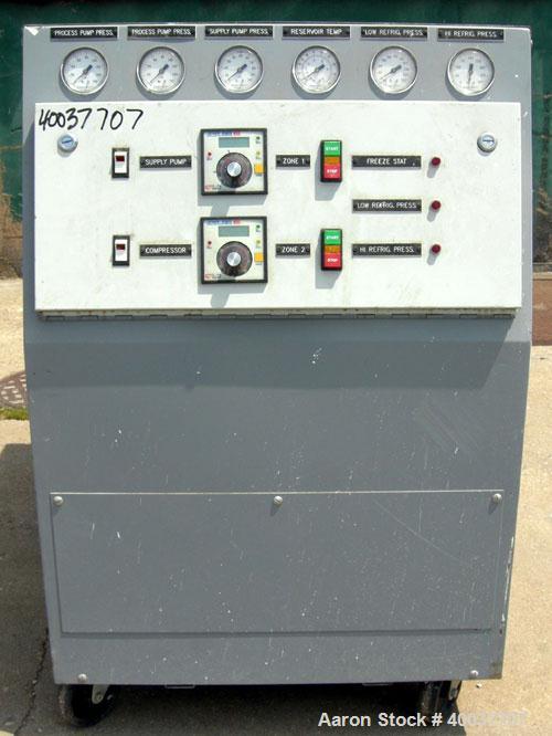Used Mokon Temperature Controller/Chiller, model 311-053. Two zone heating/chilling system with (2) KV7F04KU.  Heating units and (1) 1-1/ 2 ton air-cooled chiller.  208 volts, 3 phase, 60 hertz.  3/2...