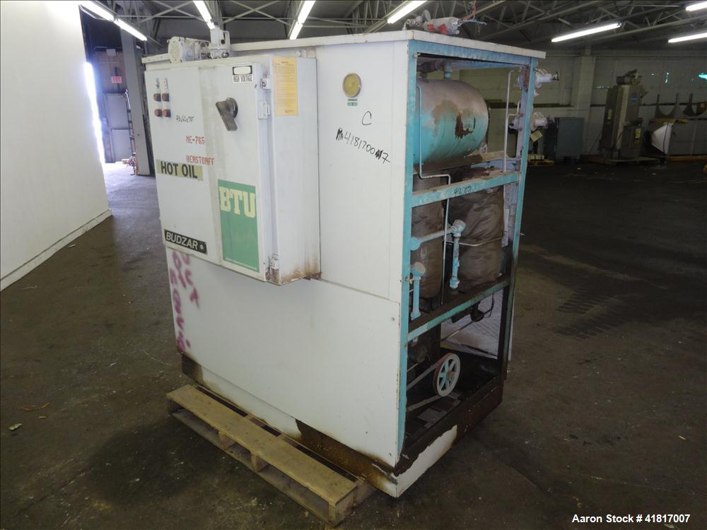 Used Budzar Dual Hot Oil Unit. Each unit has an air tank and an approximate 5 hp motor. 1" returns and discharge outlets.
