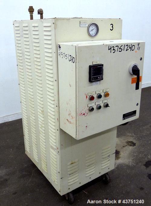 Used Chromalox Hot Oil Temperature Control Heater, 9 kW, Model OTCSW-550-9XX. Includes a control panel. Mounted on casters. 3/60/240 Volts.