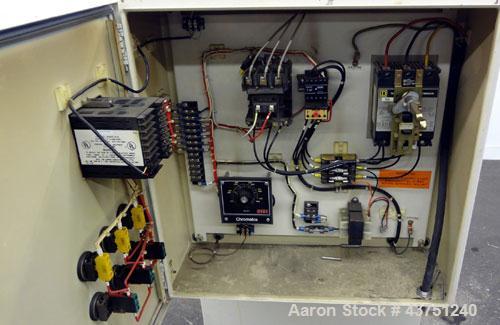 Used Chromalox Hot Oil Temperature Control Heater, 9 kW, Model OTCSW-550-9XX. Includes a control panel. Mounted on casters. 3/60/240 Volts.