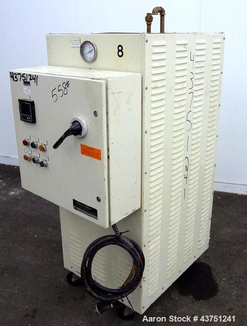 Used Chromalox Hot Oil Temperature Control Heater, 9 kW, Model OTCSW-550-9XX. Includes a control panel. Mounted on casters. 3/60/240 Volts.