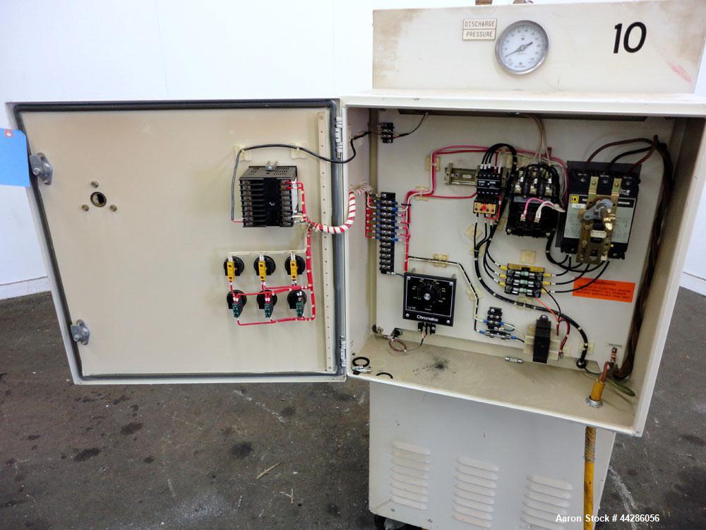 Used Chromalox Hot Oil Temperature Control Heater, 9 kW, Model OTCSW-550-9XX. Includes a control panel. Mounted on casters. 3/60/240 Volts.