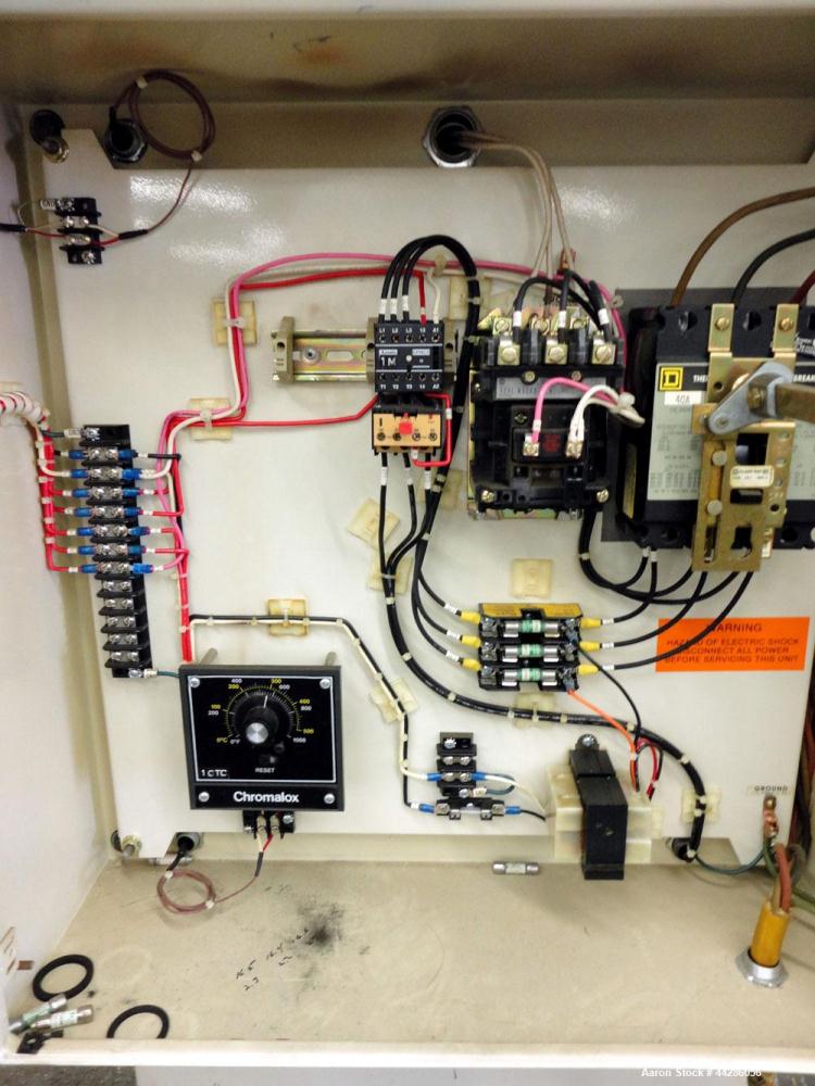 Used Chromalox Hot Oil Temperature Control Heater, 9 kW, Model OTCSW-550-9XX. Includes a control panel. Mounted on casters. 3/60/240 Volts.