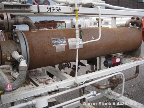 Used Chromalox electric oil heater, 30 kw capcity, electrically heated bayonet heater, 480 volt, 3 phase, skid mounted with Kontro centrifugal circulation pump, 316 stainless steel construction, 5 hp...