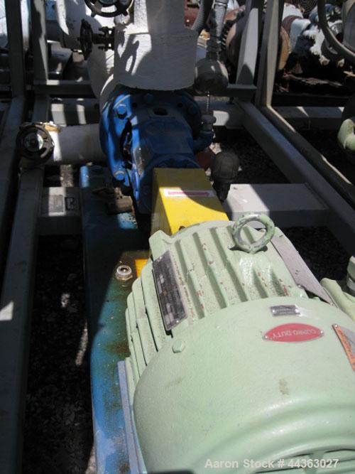 Used Chromalox Electric Oil Heater, 10 kw capacity, electrically heated bayonet heater, skid mounted with 5 hp Ingersol Rand centrifugal circulation pump.