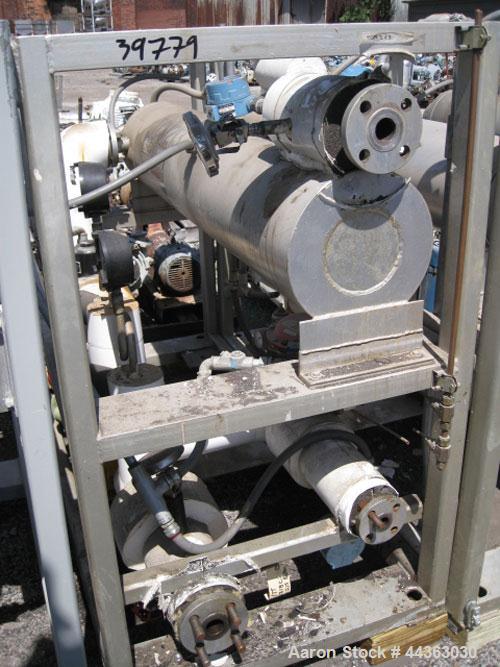 Used Chromalox Electric Oil Heater, 30 kw capacity, electrically heated bayonet heater, skid mounted with 5 hp Kontro centrifugal circulation pump, stainless steel construction, 30 gpm.