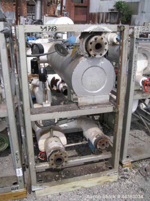 Used Chromalox Electric Oil Heater, 60 kw capacity, electrically heated bayonet heater, 480 volt, 3 phase, skid mounted with Kontro centrifugal circulation pump, carbon steel construction, 7.5 hp, 60...