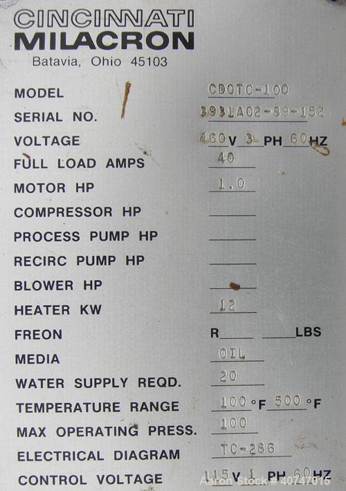 Used Cincinnati Milacron Hot Oil Temperature Control Unit,model CD0TC-100, 12 kw, 2 zones. Temperature range 100-500 deg F. 3/60/460 volt, 40 amp. Mounted on casters.