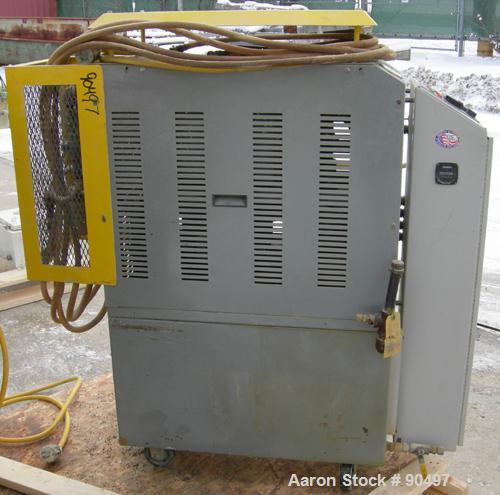 Used: Mokon hot oil temperature controller, model H54A12-S2. Maximum temperature 500 deg.f.. 3/60/460 volt, 12 kw, 15.1 heater amp. Mounted on casters. Built 2000.