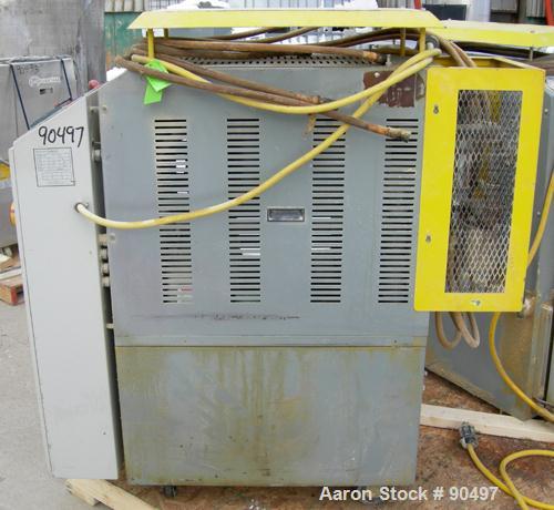 Used: Mokon hot oil temperature controller, model H54A12-S2. Maximum temperature 500 deg.f.. 3/60/460 volt, 12 kw, 15.1 heater amp. Mounted on casters. Built 2000.