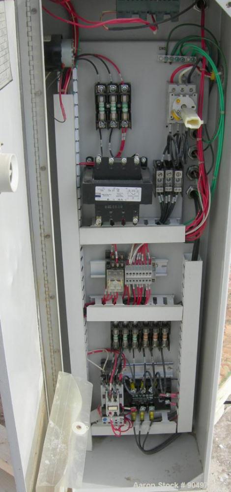 Used: Mokon hot oil temperature controller, model H54A12-S2. Maximum temperature 500 deg.f.. 3/60/460 volt, 12 kw, 15.1 heater amp. Mounted on casters. Built 2000.