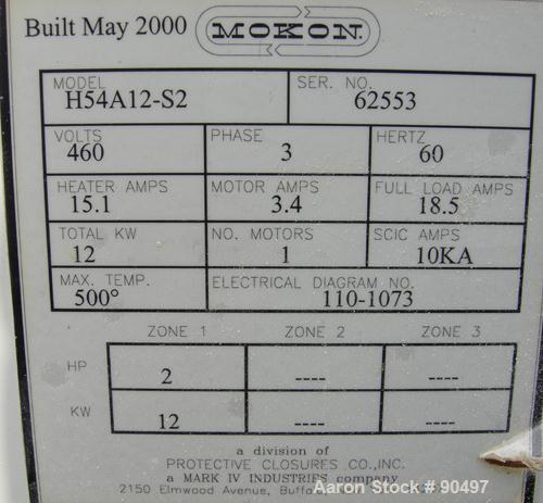 Used: Mokon hot oil temperature controller, model H54A12-S2. Maximum temperature 500 deg.f.. 3/60/460 volt, 12 kw, 15.1 heater amp. Mounted on casters. Built 2000.