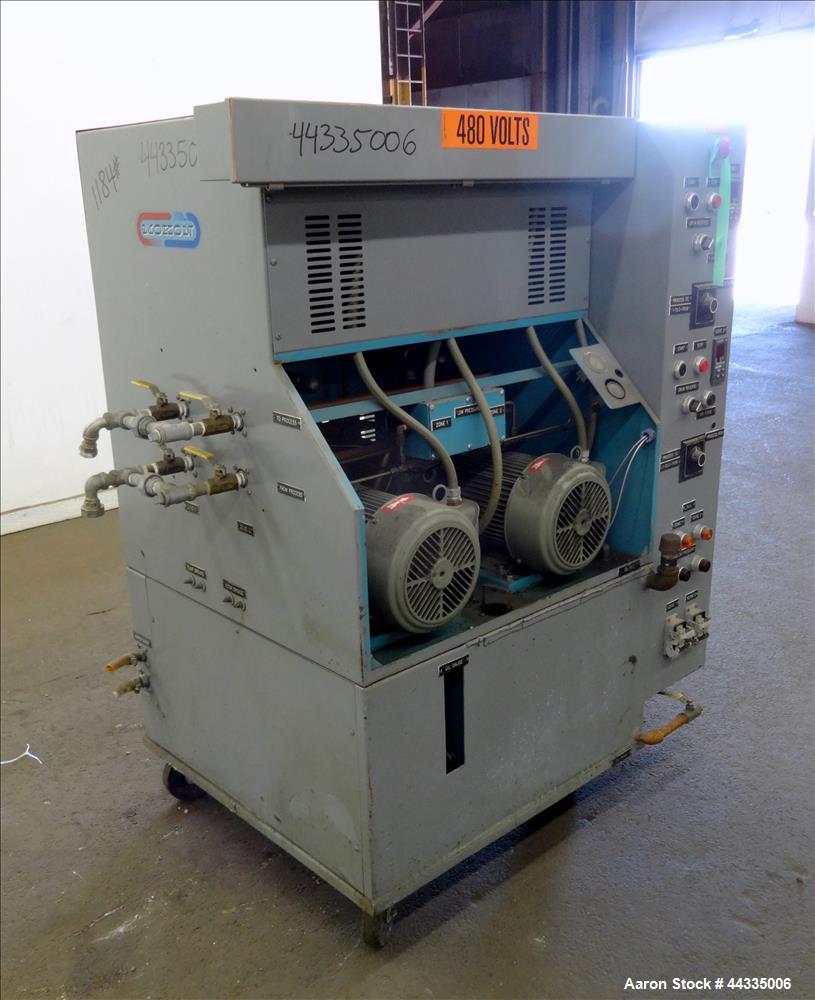 Used Mokon 12 Kw Oil Heater, Model MR4S06-EZ. (2) Zones, 6kW each. Driven by 1-1/2 hp motors. 3/60/480 volt. Mounted on a carbon steel frame. Serial# 29408, built 1993.