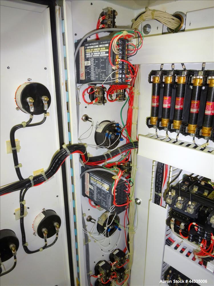 Used Mokon 12 Kw Oil Heater, Model MR4S06-EZ. (2) Zones, 6kW each. Driven by 1-1/2 hp motors. 3/60/480 volt. Mounted on a carbon steel frame. Serial# 29408, built 1993.