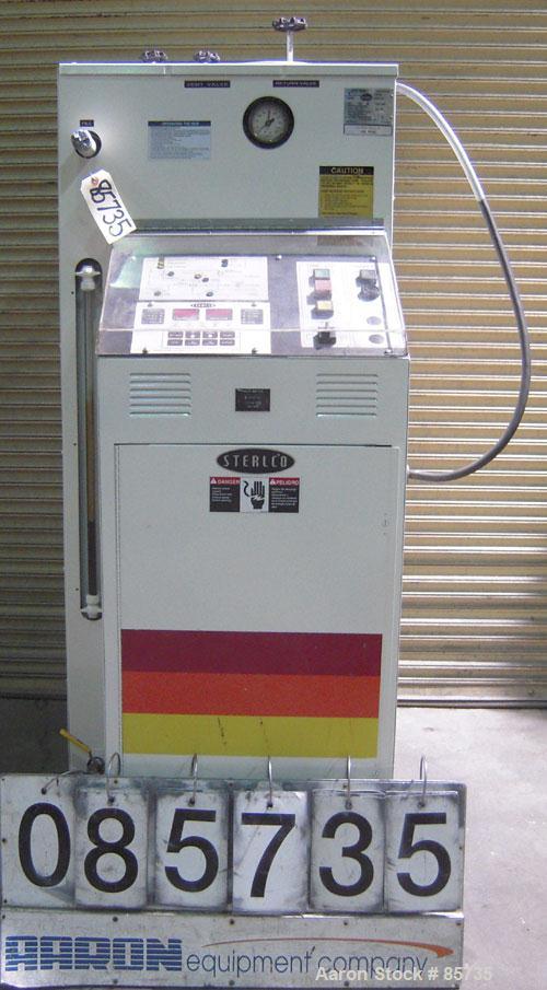 Used Sterlco Hot Oil Temperature Control Unit, Model M2B9026-J1. Single zone oil heater, 18 total kW. Temperature range to 550 deg F. 3/60/460 volt. M2B control panel. Mounted on casters.