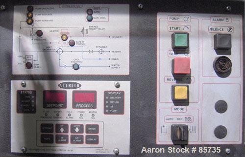 Used Sterlco Hot Oil Temperature Control Unit, Model M2B9026-J1. Single zone oil heater, 18 total kW. Temperature range to 550 deg F. 3/60/460 volt. M2B control panel. Mounted on casters.