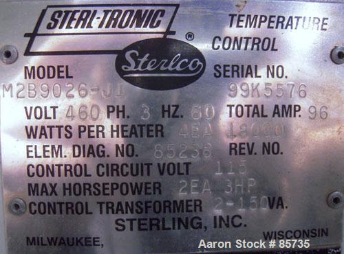 Used Sterlco Hot Oil Temperature Control Unit, Model M2B9026-J1. Single zone oil heater, 18 total kW. Temperature range to 550 deg F. 3/60/460 volt. M2B control panel. Mounted on casters.