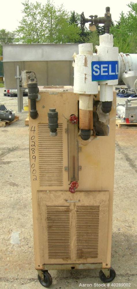 Used Sterlco Hot Oil Temerature Controller, Model M6016-DX. 12 kW, 3/60/460 volt, 16 amp. Mounted on casters.