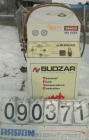 USED: Budzar Industries thermal fluid hot oil temperature controller, model 10T-1220-VLC. 3/60/460 volt, 17.4 amp. 12 kW heater. Temperature range 200 to 450 deg F. Mounted on casters.