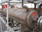 Used Chromalox electric oil heater, 30 kw capcity, electrically heated bayonet heater, 480 volt, 3 phase, skid mounted with Kontro centrifugal circulation pump, 316 stainless steel construction, 5 hp...