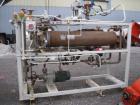 Used Chromalox electric oil heater, 30 kw capcity, electrically heated bayonet heater, 480 volt, 3 phase, skid mounted with Kontro centrifugal circulation pump, 316 stainless steel construction, 5 hp...