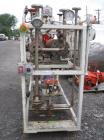 Used Chromalox electric oil heater, 30 kw capcity, electrically heated bayonet heater, 480 volt, 3 phase, skid mounted with Kontro centrifugal circulation pump, 316 stainless steel construction, 5 hp...