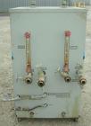 Used Cincinnati Milacron Hot Oil Temperature Control Unit,model CD0TC-100, 12 kw, 2 zones. Temperature range 100-500 deg F. 3/60/460 volt, 40 amp. Mounted on casters.