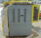 Used: Mokon hot oil temperature controller, model H54112CH. Maximum temperature 500 deg.f.. 3/60/460 volt, 12 kw, 15.1 heater amp. Mounted on casters. Built 2005