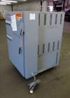 Used Mokon 12 Kw Oil Heater, Model MR4S06-EZ. (2) Zones, 6kW each. Driven by 1-1/2 hp motors. 3/60/480 volt. Mounted on a carbon steel frame. Serial# 29408, built 1993.