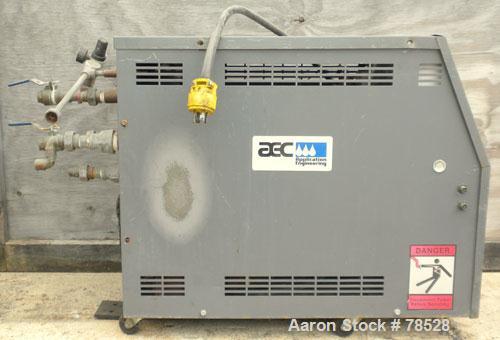 Used AEC Water Temperature Control Unit, Model TDW-1NX-Q. Heater rated 9 kW, 3/4 hp, 3/60/208-230/460 volt, 3450/2850 rpm pump. 1" inlet and outlet, maximum temperature rating 250 deg F. Mounted on c...