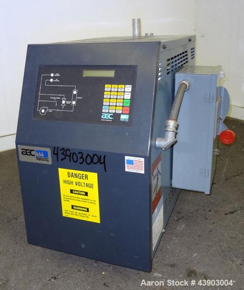 Used AEC Water Temperature Control Unit, Model TDW-1XT.  9 kW Heater, maximum temperature rating 230 degrees F. Includes an AEC Micro-Computer panel. 3/60/460 Volt. Mounted on casters.