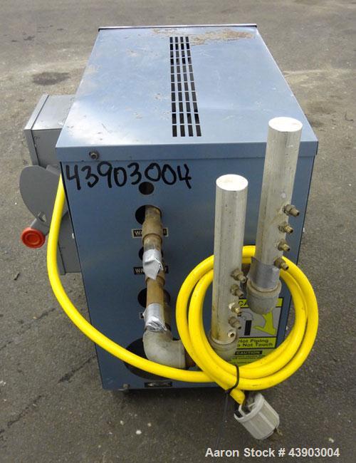 Used AEC Water Temperature Control Unit, Model TDW-1XT.  9 kW Heater, maximum temperature rating 230 degrees F. Includes an AEC Micro-Computer panel. 3/60/460 Volt. Mounted on casters.