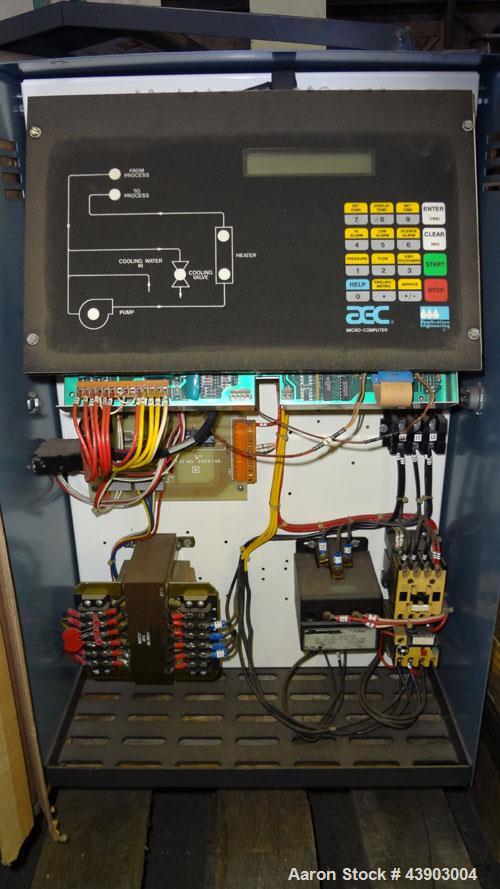 Used AEC Water Temperature Control Unit, Model TDW-1XT.  9 kW Heater, maximum temperature rating 230 degrees F. Includes an AEC Micro-Computer panel. 3/60/460 Volt. Mounted on casters.
