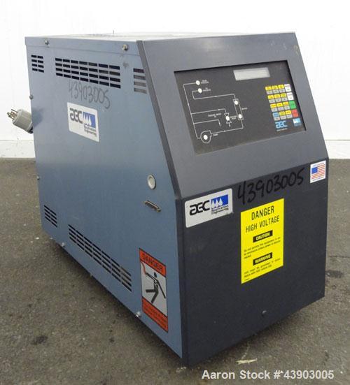 Used AEC Water Temperature Control Unit, Model TDW-1XT.  9 kW Heater, maximum temperature rating 230 degrees F. Includes an AEC Micro-Computer panel. 3/60/460 Volt. Mounted on casters.
