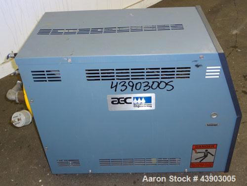 Used AEC Water Temperature Control Unit, Model TDW-1XT.  9 kW Heater, maximum temperature rating 230 degrees F. Includes an AEC Micro-Computer panel. 3/60/460 Volt. Mounted on casters.