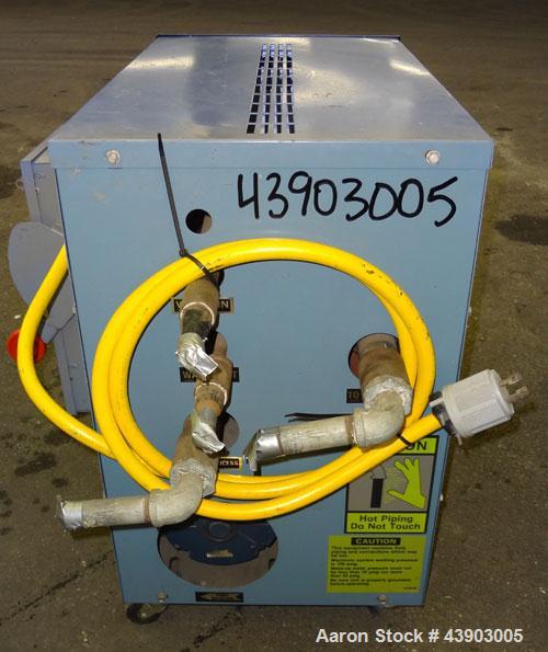Used AEC Water Temperature Control Unit, Model TDW-1XT.  9 kW Heater, maximum temperature rating 230 degrees F. Includes an AEC Micro-Computer panel. 3/60/460 Volt. Mounted on casters.